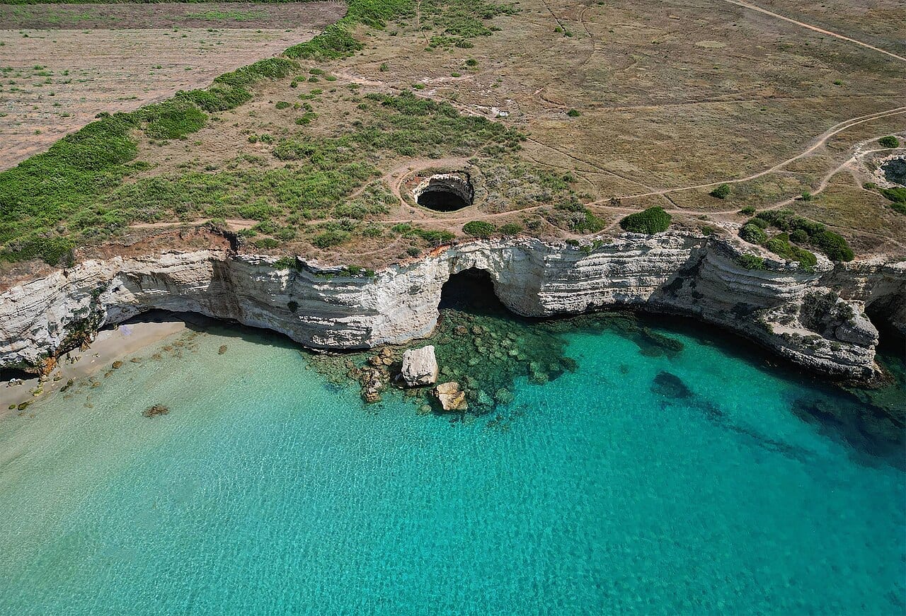 Mulino d'Acqua bay — cliffs and turquoise water